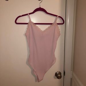 Light pink body suit